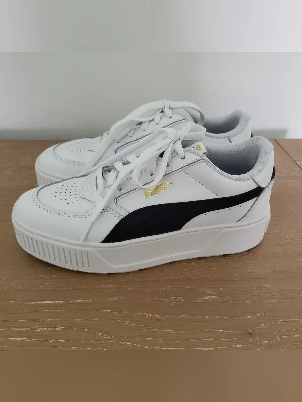 Women's Puma White Sneakers with Black Formstrip